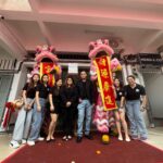 Group photo with lion dance outside IBS Batu Pahat