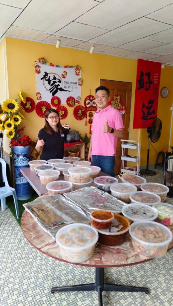 Staff with food donation at Old Home